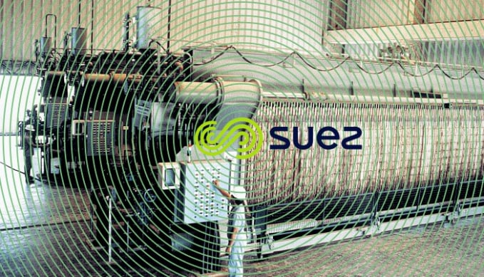 Installation d’Achères pour le SIAPP – Capacité : 230 t · j–1 de MS – 14 filtres-presse à suspension latérale (140 plateaux de 1 500 × 1 500)